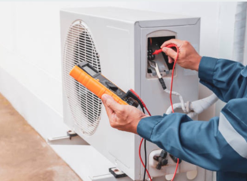 Technician installing a home appliance