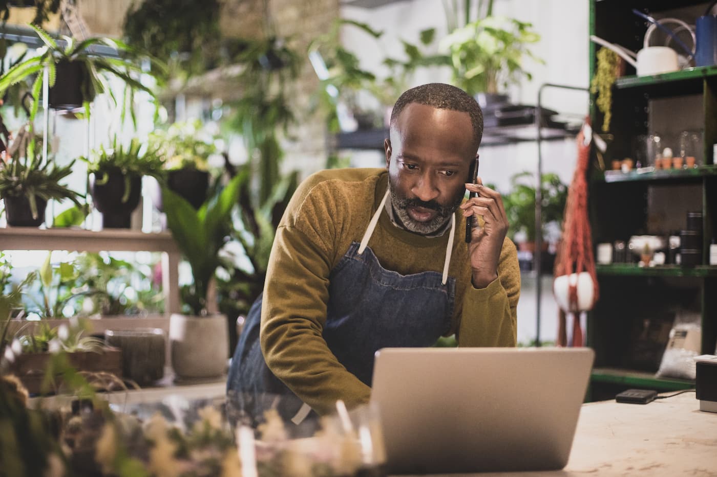 Small business owner managing customer service