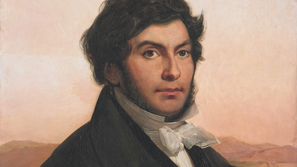 Jean-François Champollion studying Egyptian hieroglyphs