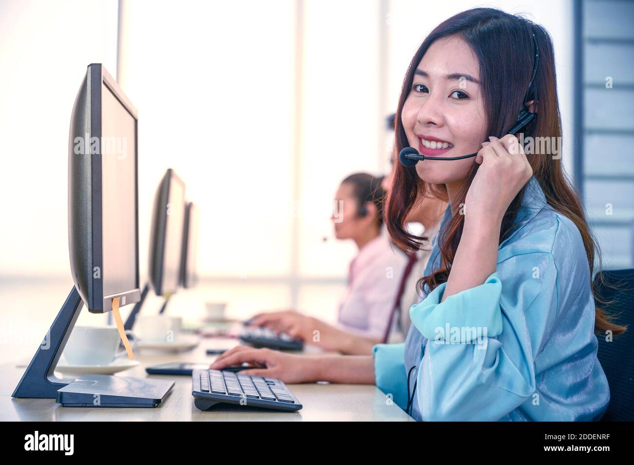 Friendly customer support team answering Frontier Airlines questions
