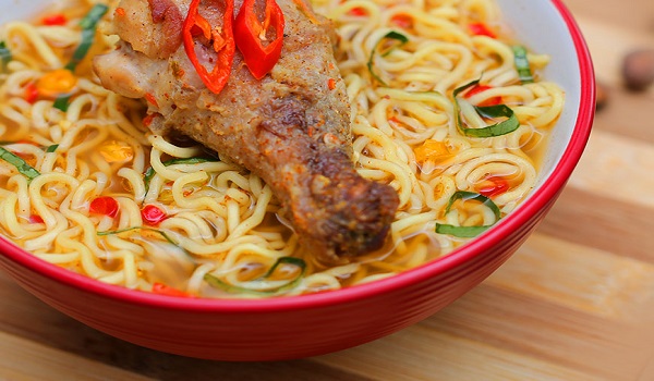 Chicken noodles made with indomie, grilled chicken, bell peppers, onions, soy sauce and spices - RoyalRoom Restaurant Lagos