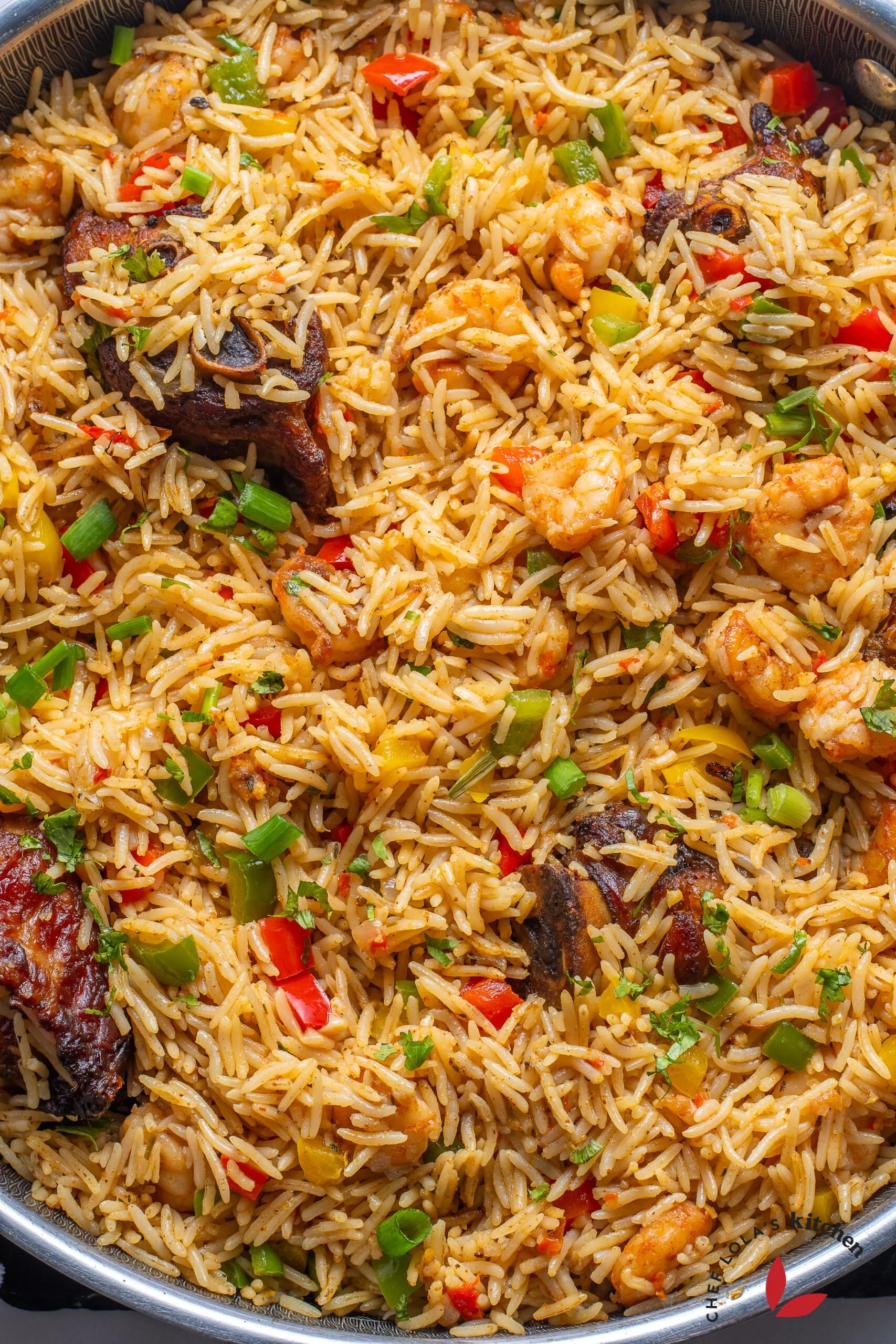 Coconut rice made with long grain rice, fresh coconut milk, shrimp, scotch bonnet, onions, bay leaves and seasoning - RoyalRoom Restaurant Lagos