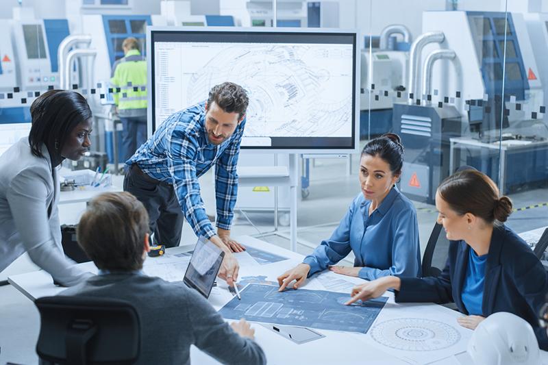 Interdisciplinary team of engineers and scientists working together