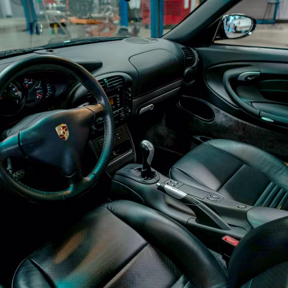 Porsche 996 GT3 interior showing driver-focused cockpit