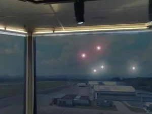 Reprodução artística da torre de controle do Aeroporto de São José dos Campos durante a Noite dos OVNIs em 1986, mostrando luzes misteriosas no céu noturno