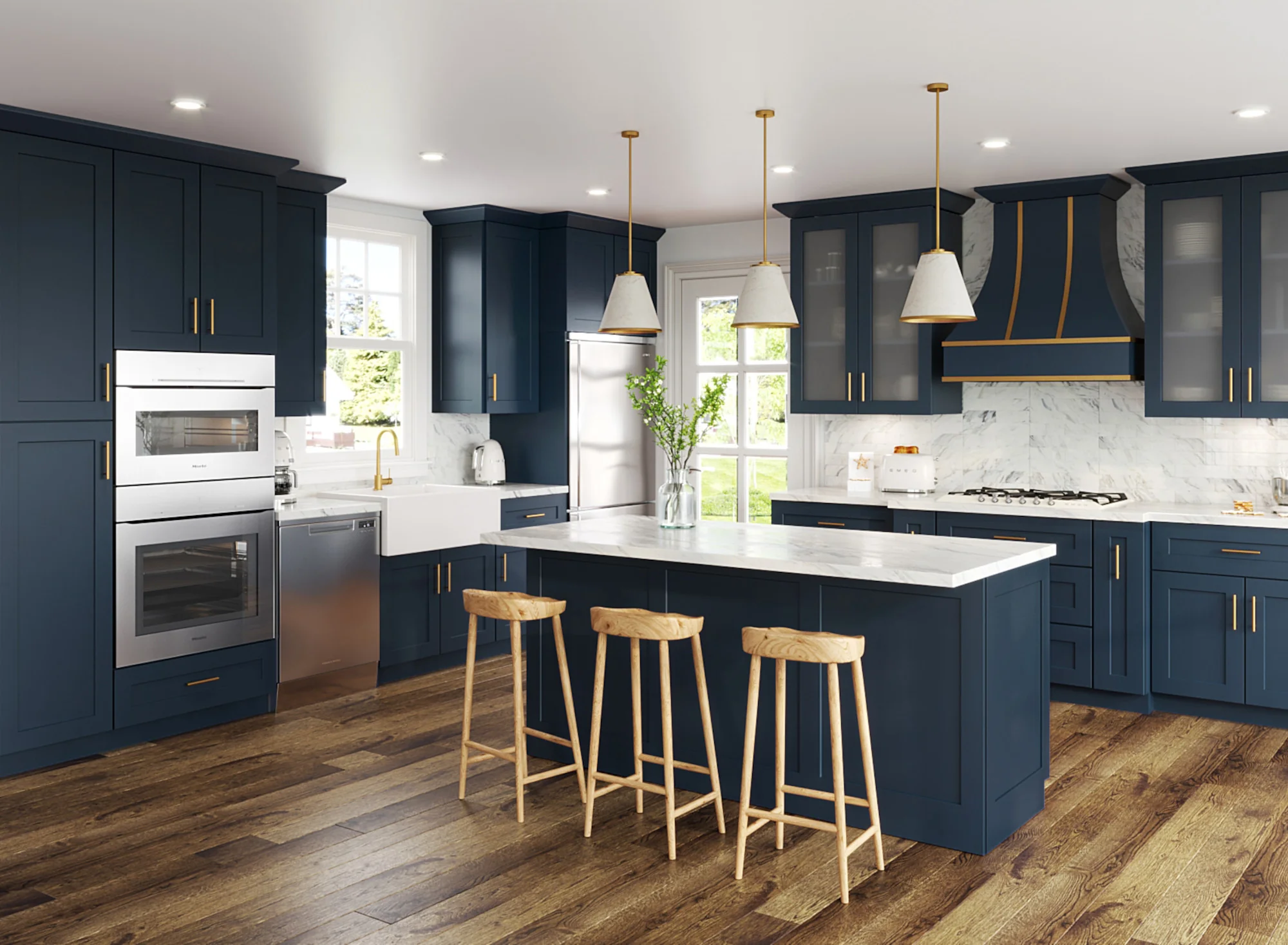 Navy blue Shaker cabinets with gold hardware and white countertops