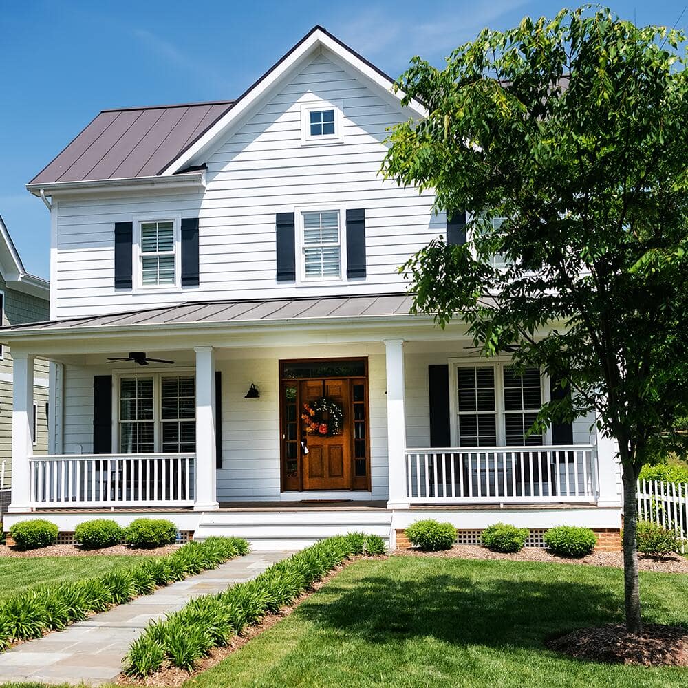 White vinyl siding house exterior