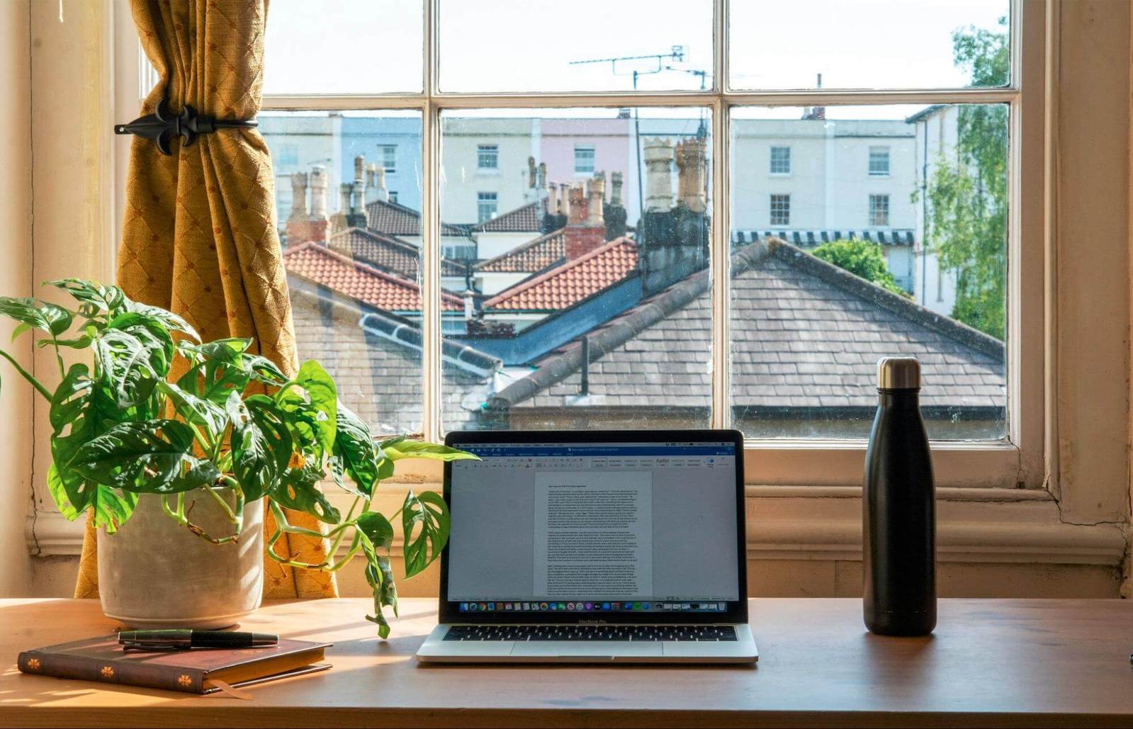 Clean laptop workspace with natural light