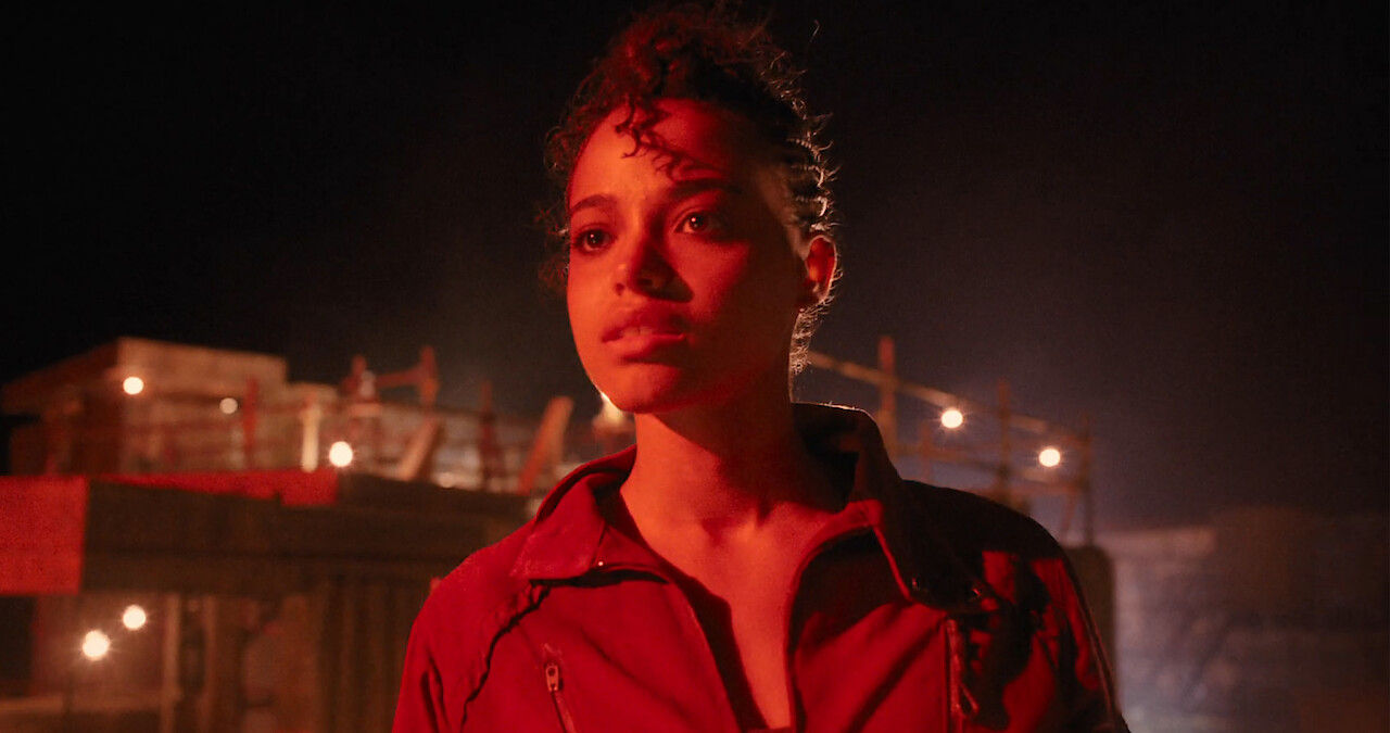 Netflix Resident Evil series cast in dramatic red-lit scene