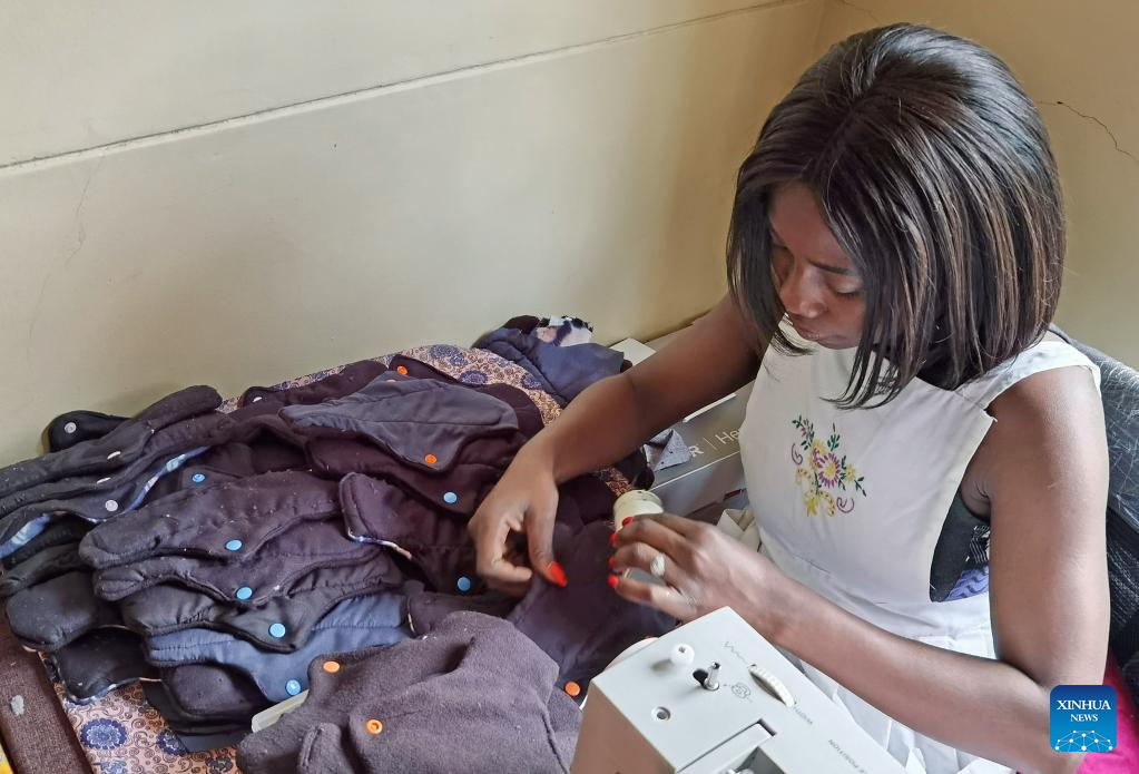 Women producing reusable sanitary pads