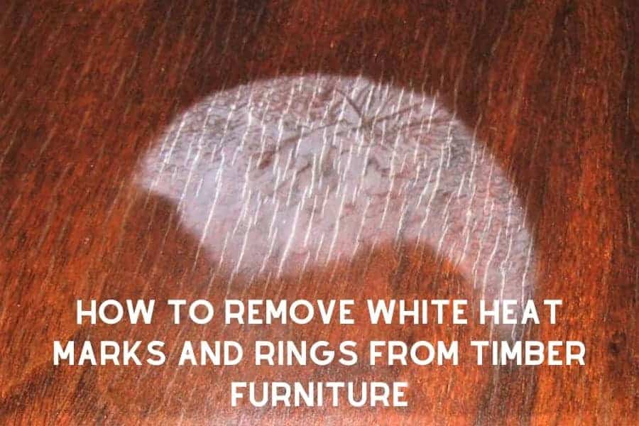 White heat mark damage on dark timber furniture showing when professional repair is needed