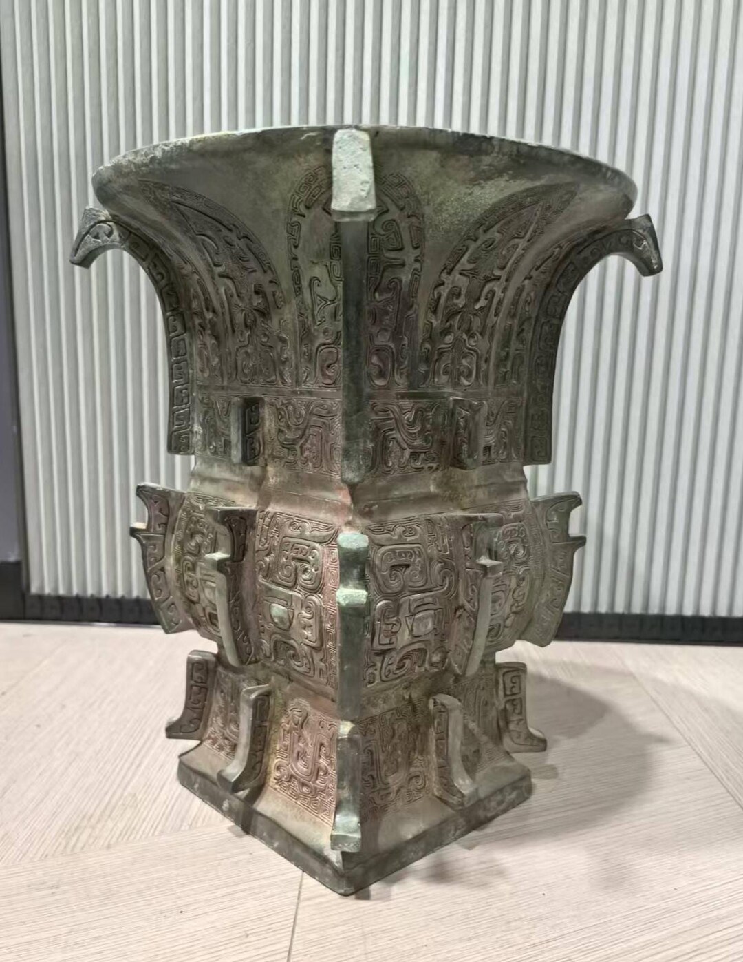 Close-up of taotie mask design on Chinese bronze vessel