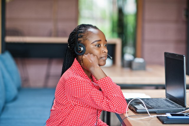 Customer service representative assisting a client in Kenya