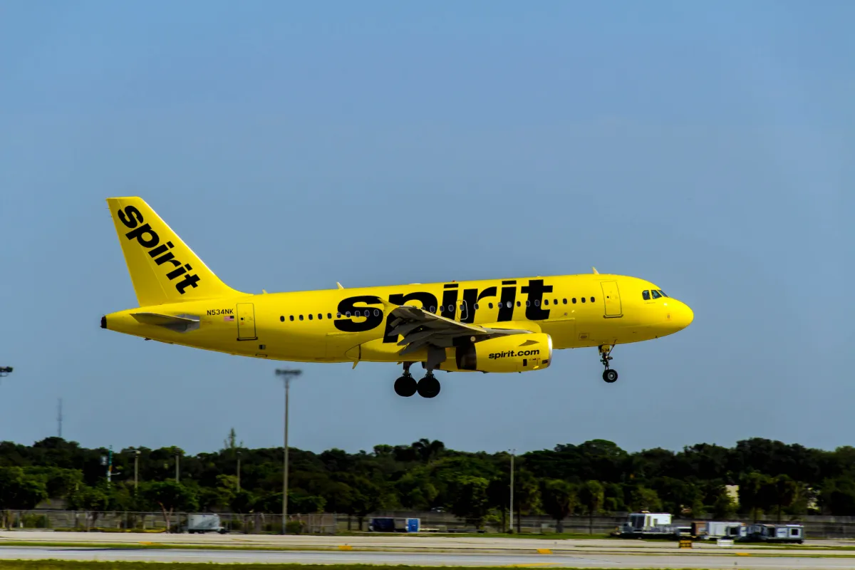 Spirit Airlines yellow Airbus aircraft landing