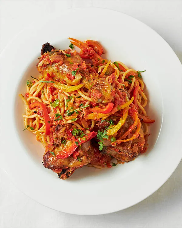 Special noodles made with indomie, assorted meat, peppers, onions, carrots and seasoning cubes - RoyalRoom Restaurant Lagos