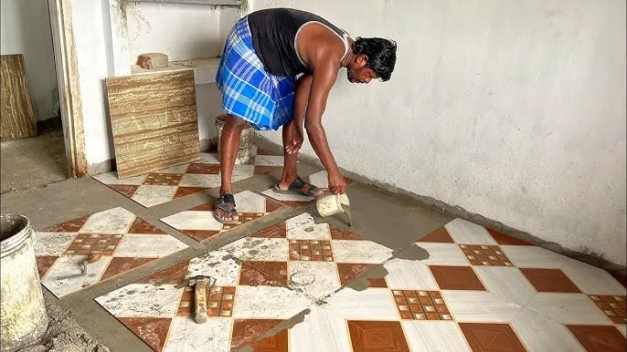 Kenyan tiler at work