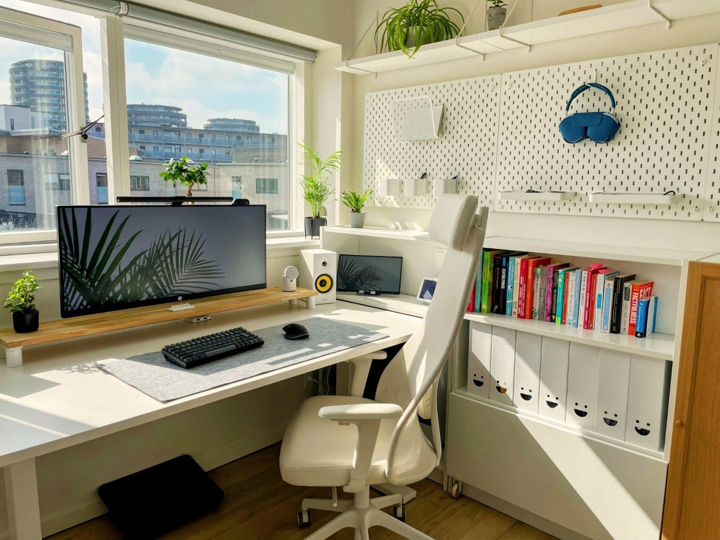 Aesthetic blogging workspace setup with monitor and desk organization