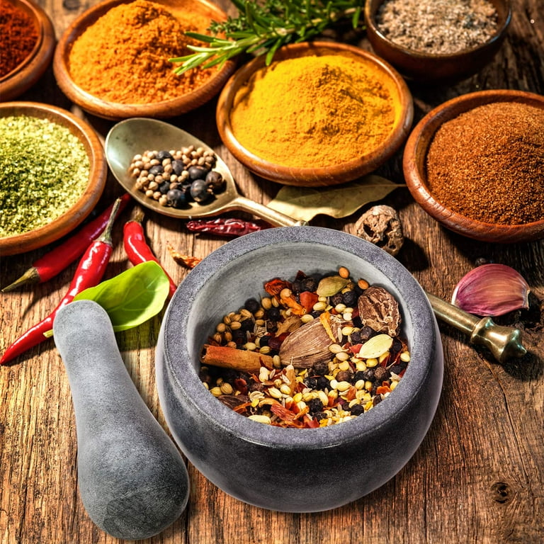 Traditional Indian spices in mortar and pestle