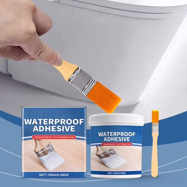 Waterproof adhesive applied with brush near toilet base