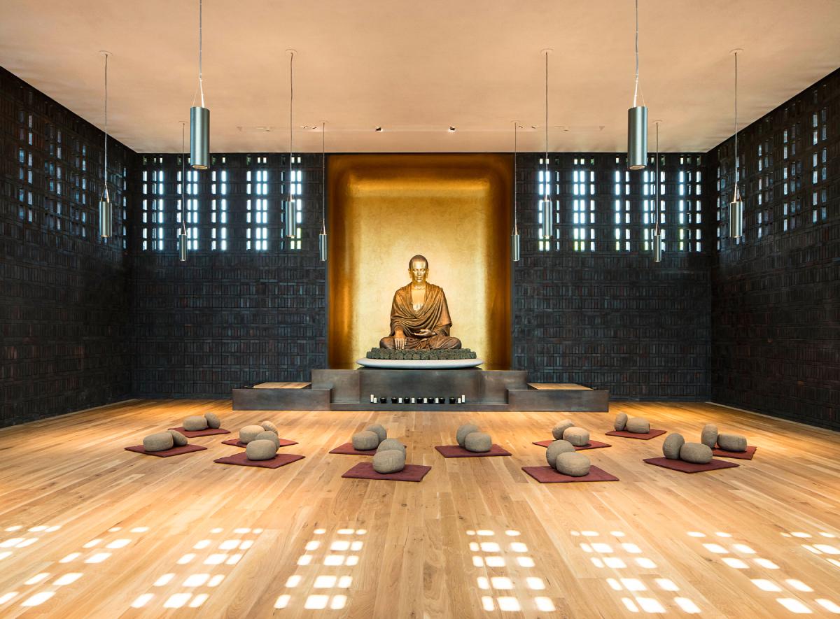 Modern meditation center with traditional Buddhist elements