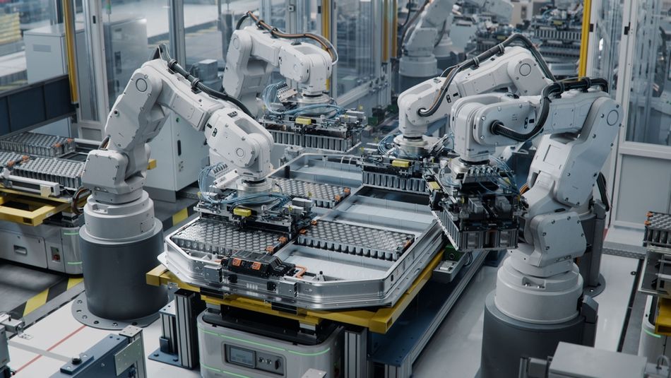 Robot working on factory assembly line