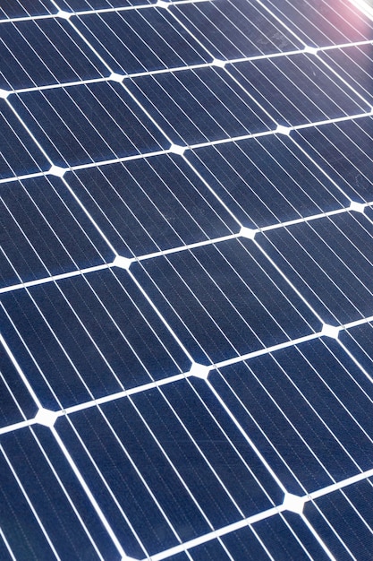 Close-up of photovoltaic solar cells showing grid lines and textures