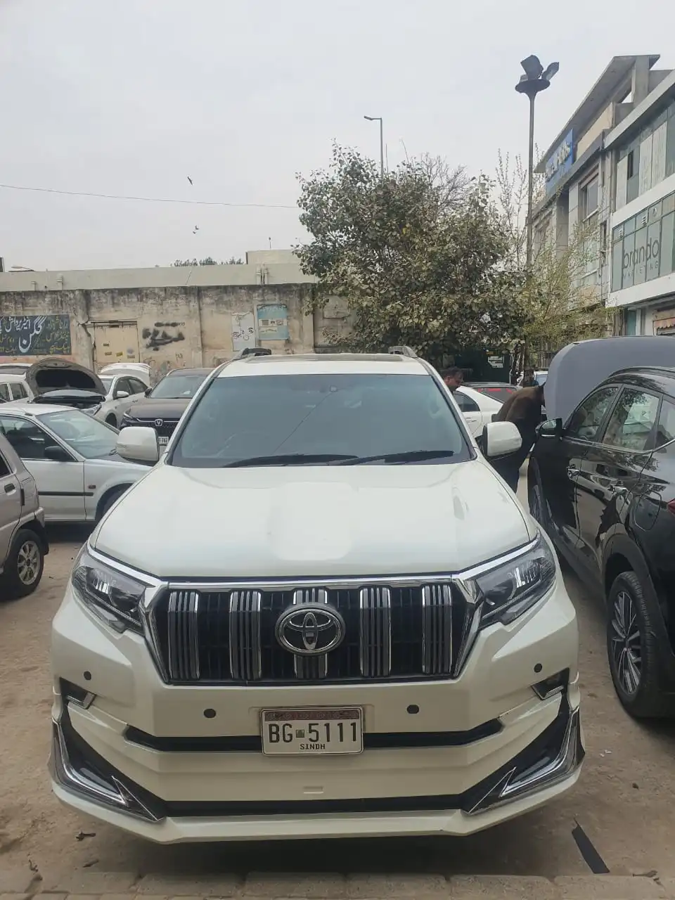 Toyota Prado TX 4x4 white SUV for rent in Skardu and Hunza with driver