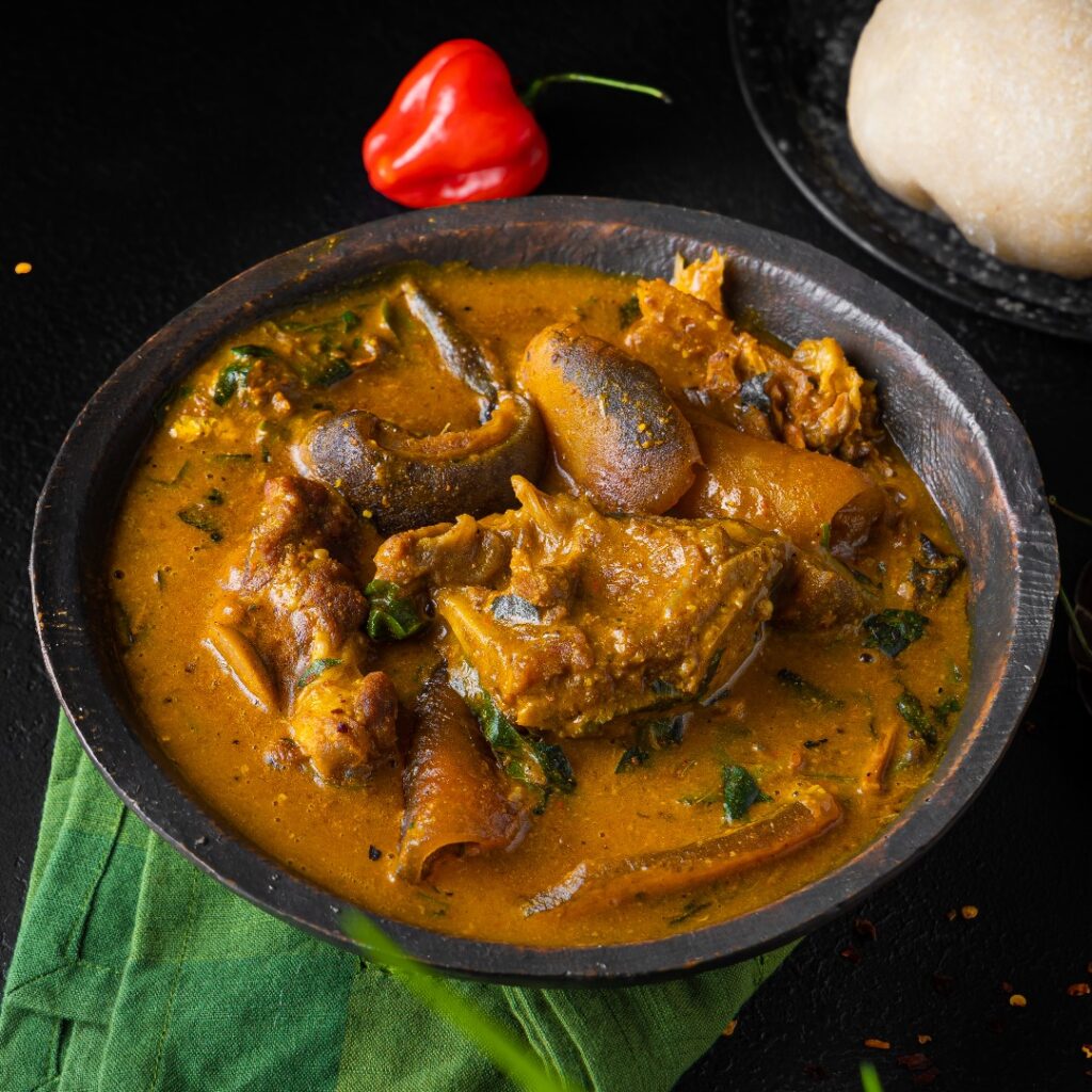 Ogbono soup made with ground ogbono seeds, assorted meat, stockfish, crayfish, red palm oil, scotch bonnet and uziza leaves - RoyalRoom Restaurant Lagos