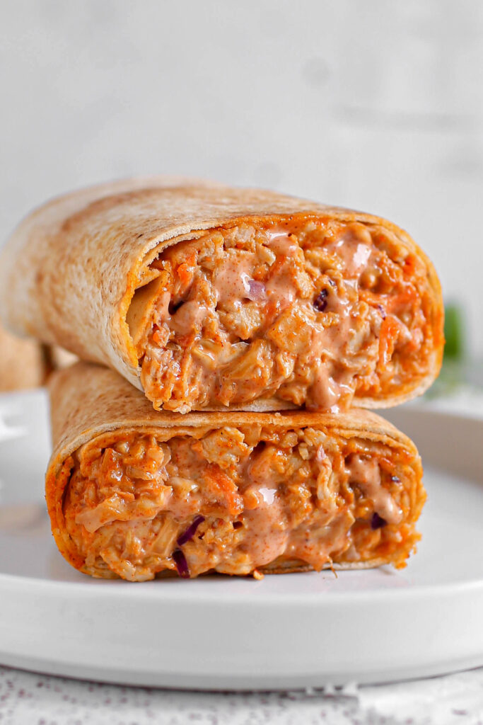 Mix shawarma made with flatbread, grilled chicken, seasoned beef, coleslaw, tomatoes, cucumber, garlic sauce and suya spice - RoyalRoom Restaurant Lagos