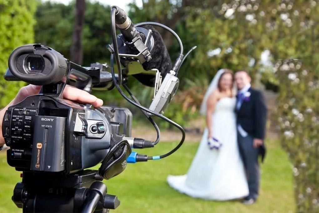 Professional videographer at wedding