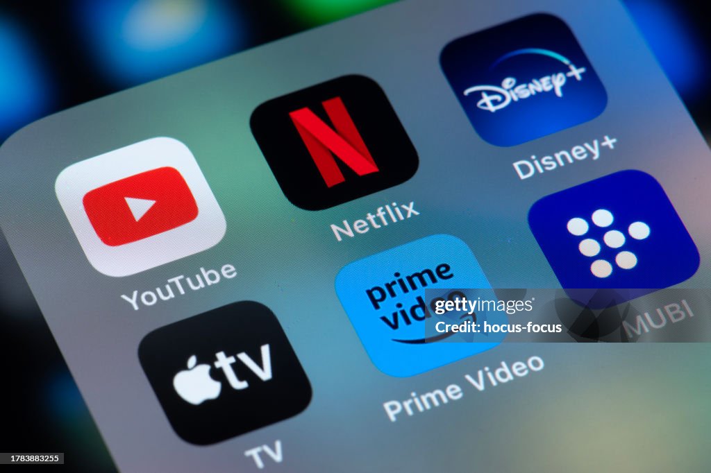 iPhone 主屏幕显示 Netflix Disney+ YouTube 等流媒体应用图标