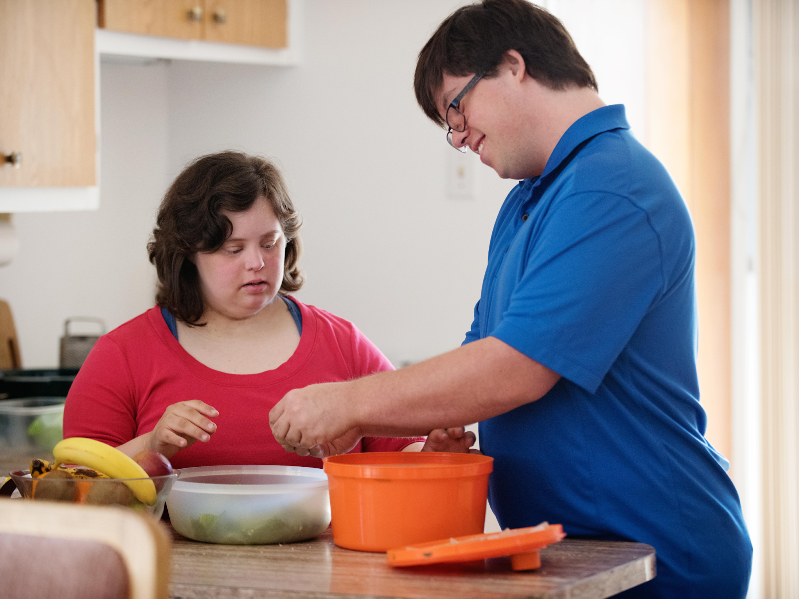 Person with disability cooking independently with support