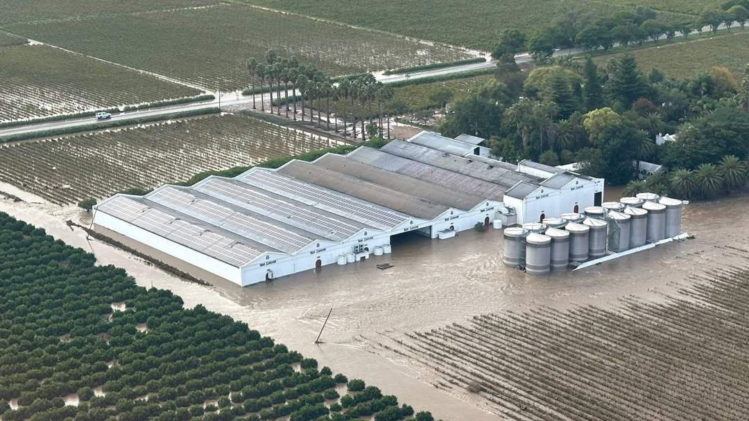 Aerial view of Van Loveren winery surrounded by floodwaters