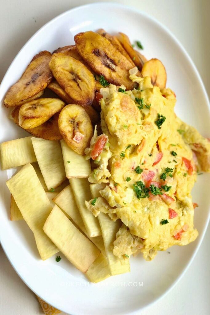 Fried yam and egg sauce made with white yam, fresh eggs, tomatoes, green pepper, onions, vegetable oil and seasoning - RoyalRoom Restaurant Lagos