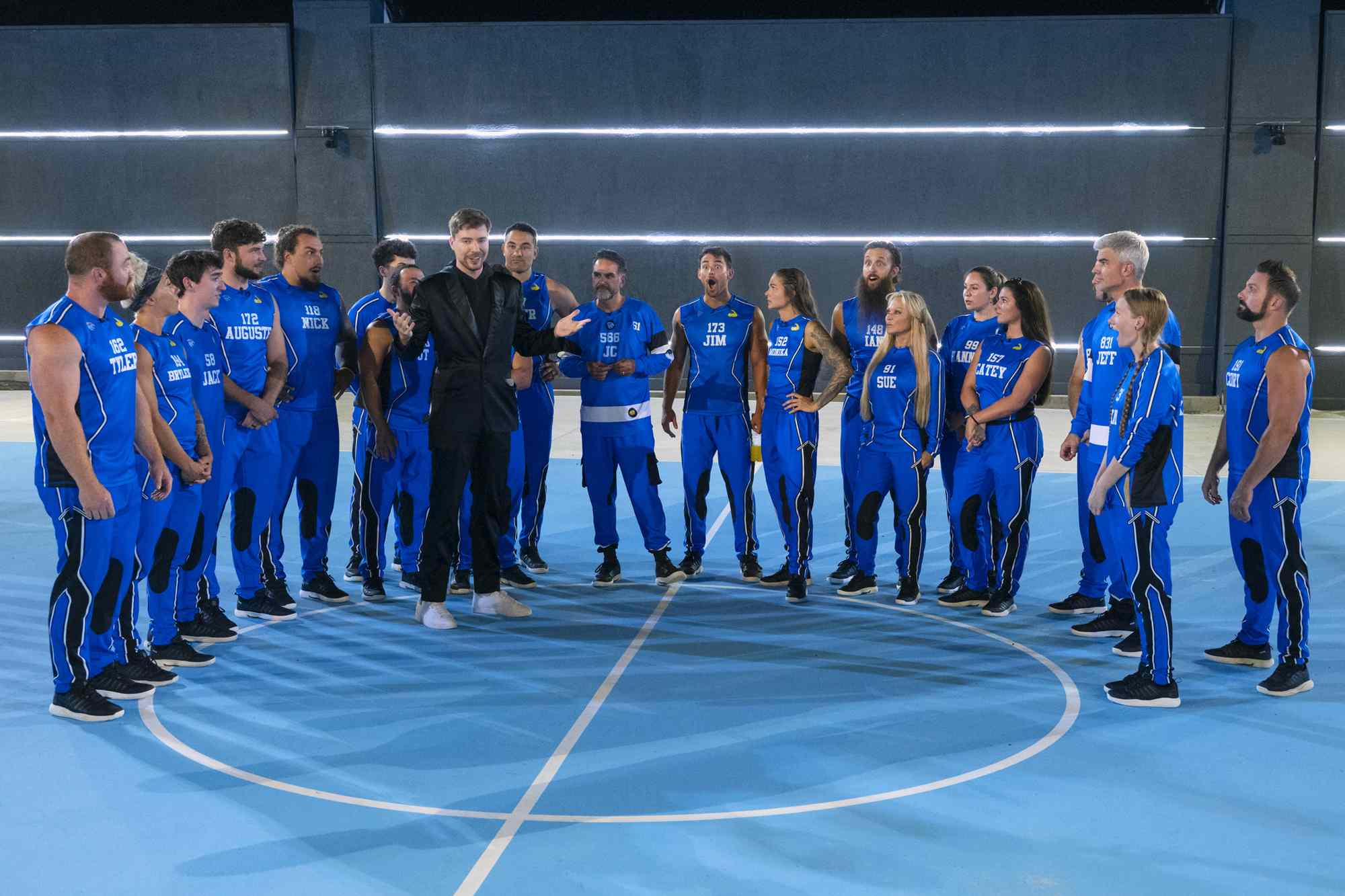 Beast Games Contestants in Blue Uniforms