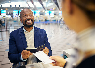 Travel agent helping customer at airport desk