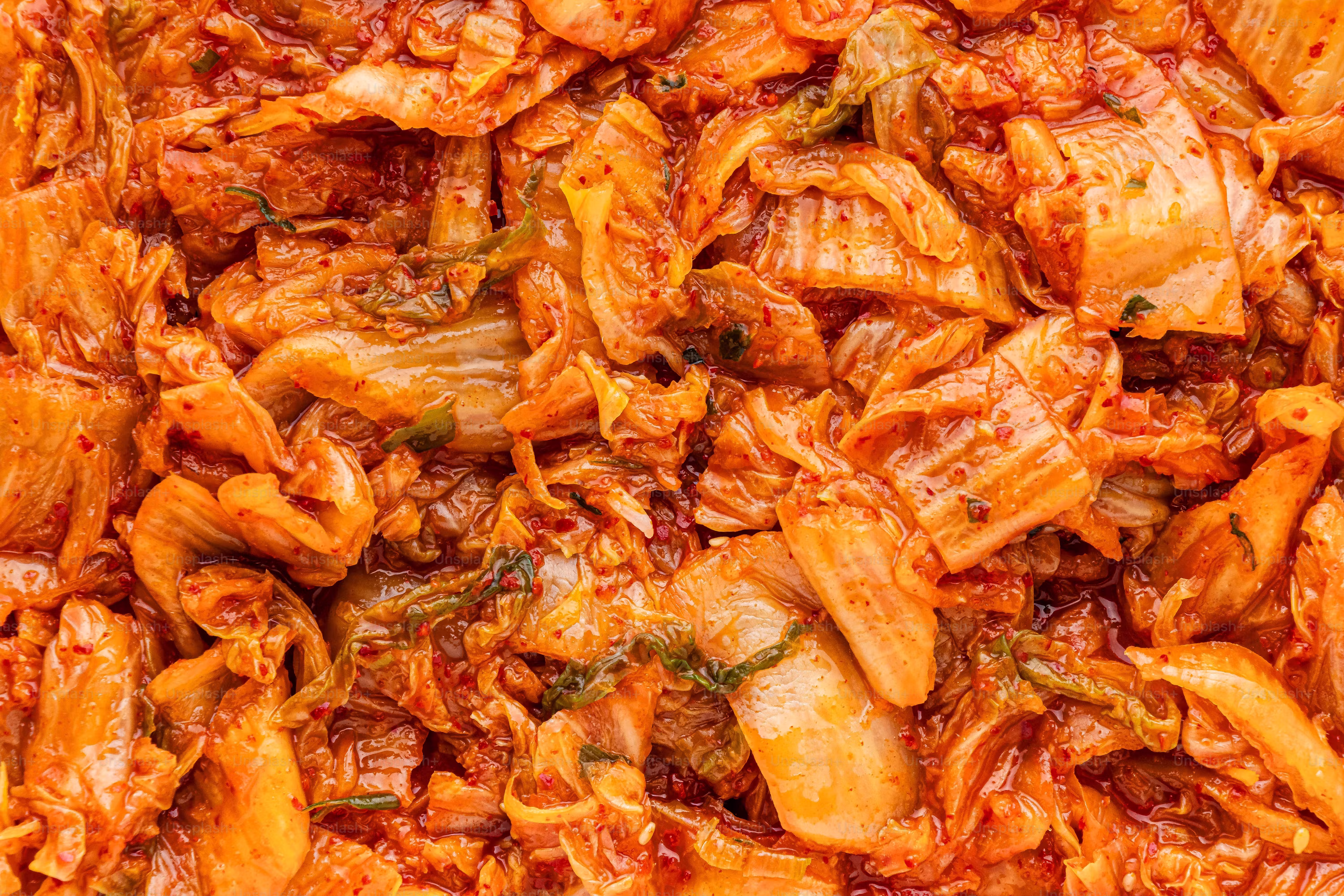 Close up of vibrant red kimchi fermented cabbage texture