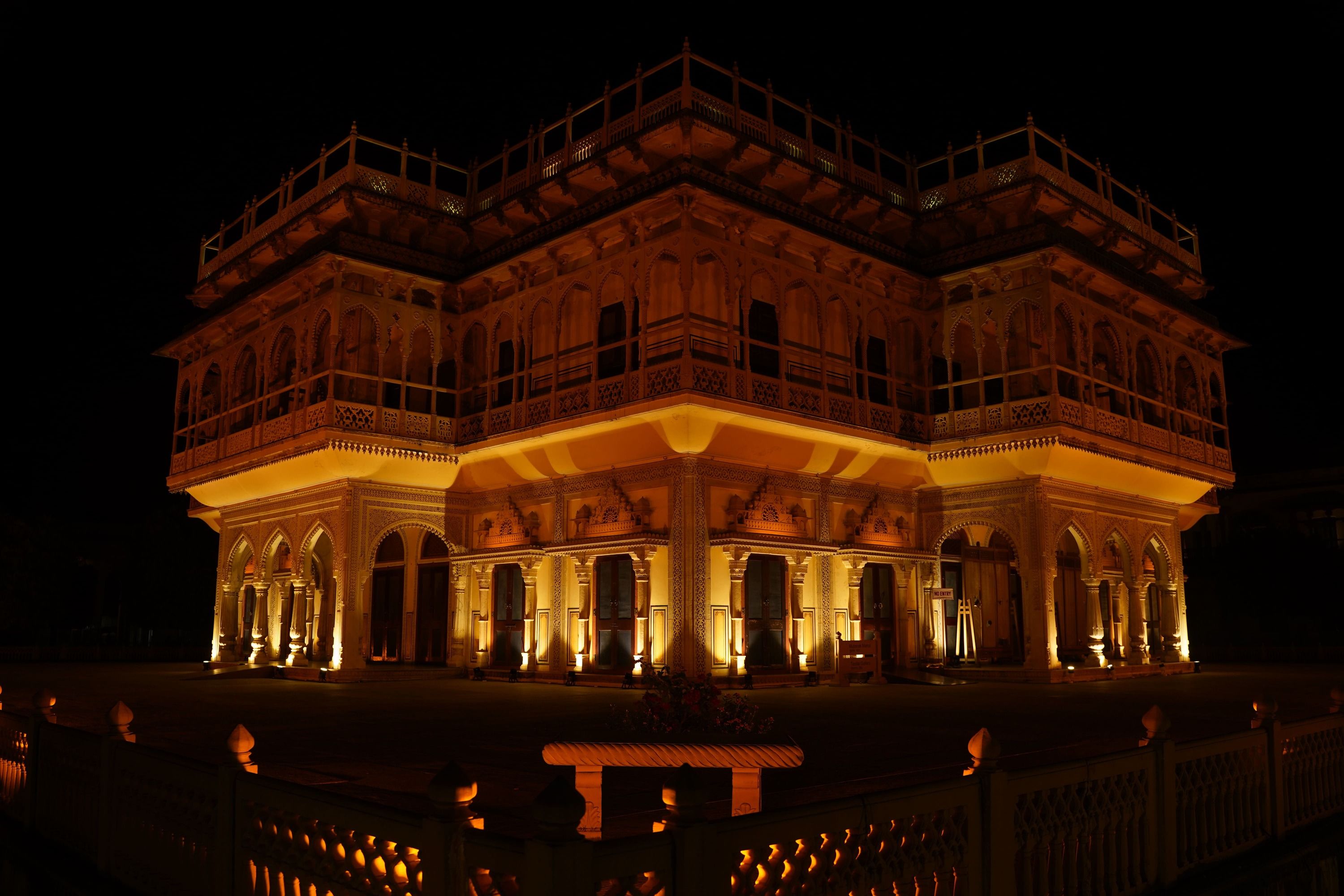 Jaipur City Palace illuminated at night showing heritage architecture