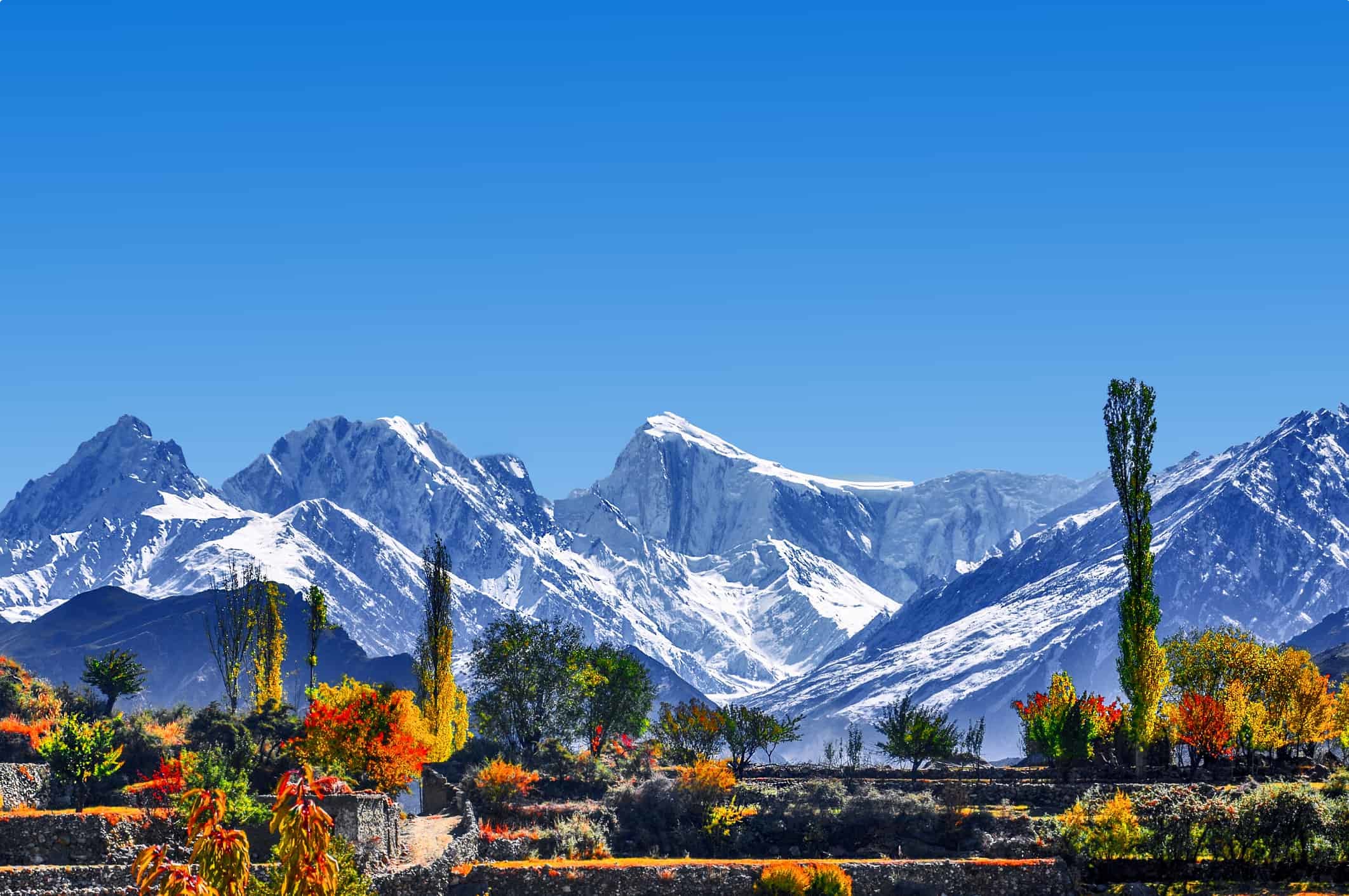 Skardu Valley Pakistan with snow-capped mountains and autumn colors