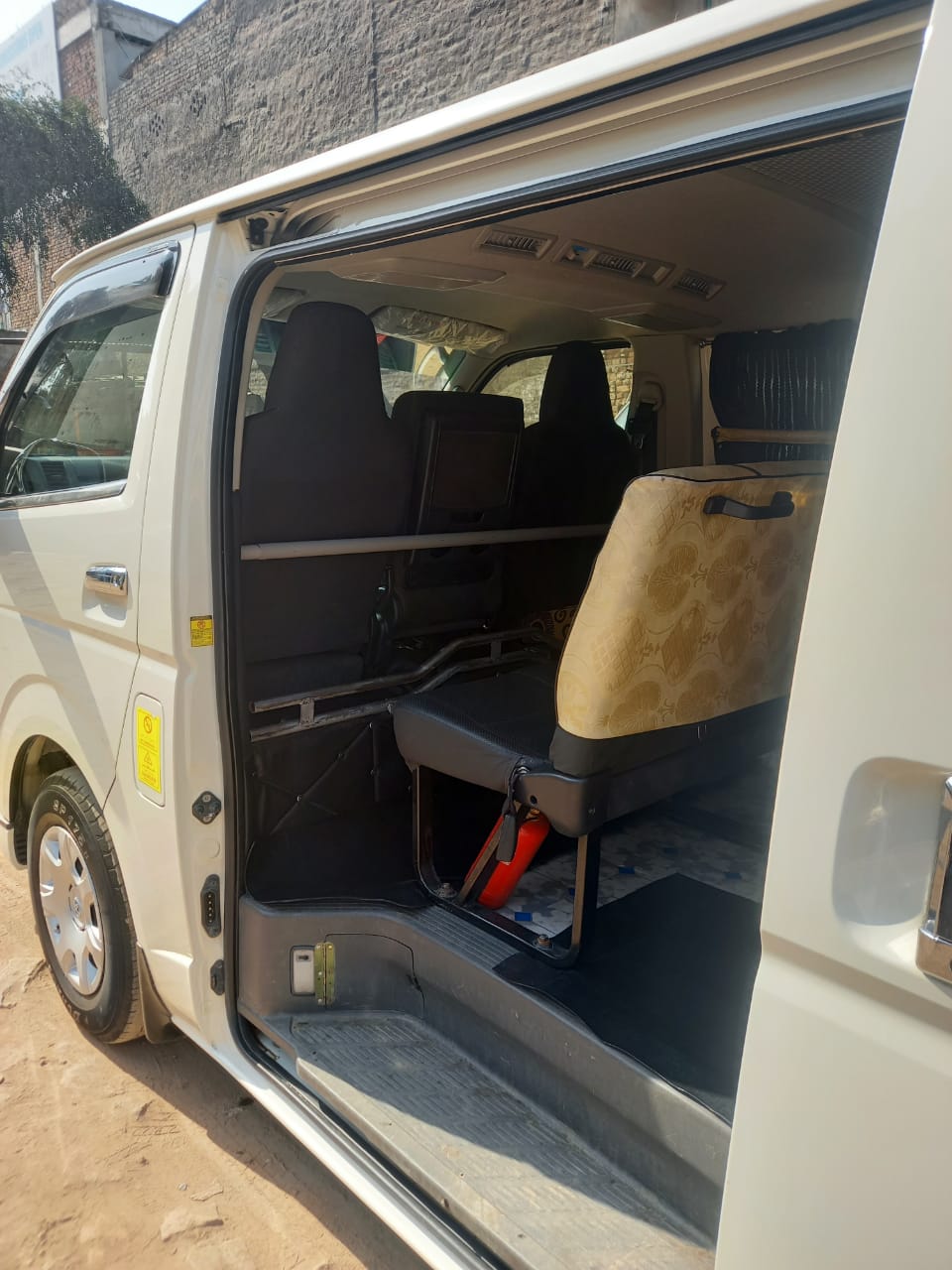 Toyota Hiace standard van rental interior view for group tours Pakistan