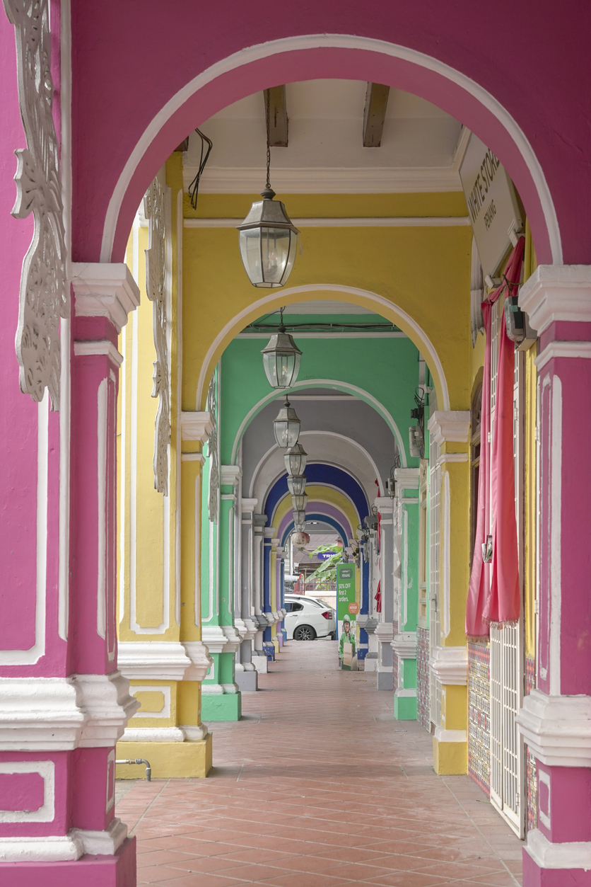 Colorful colonial buildings and heritage shophouses in George Town, Penang