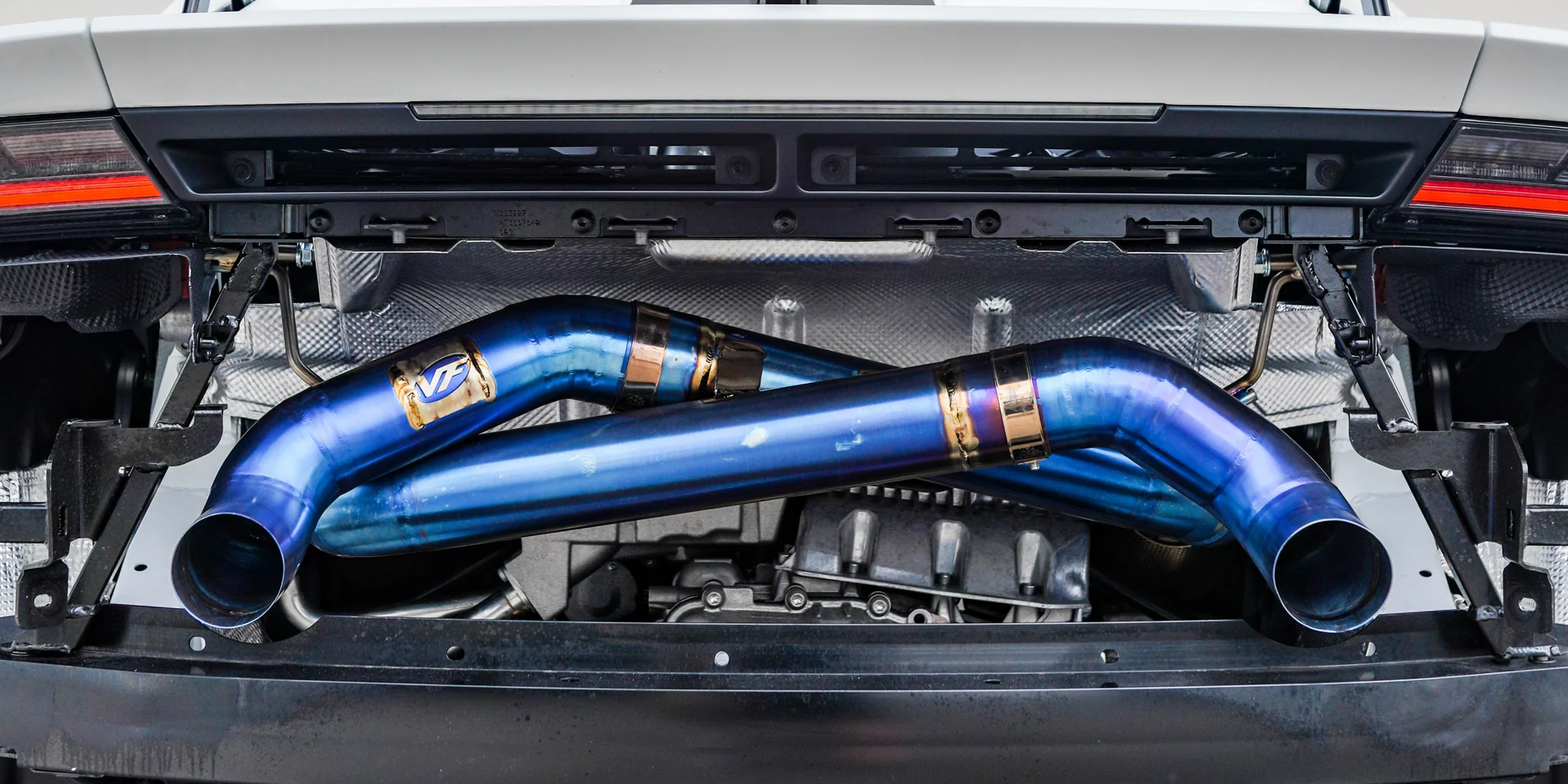 Lamborghini Huracan GT3 race car engine bay with exhaust system