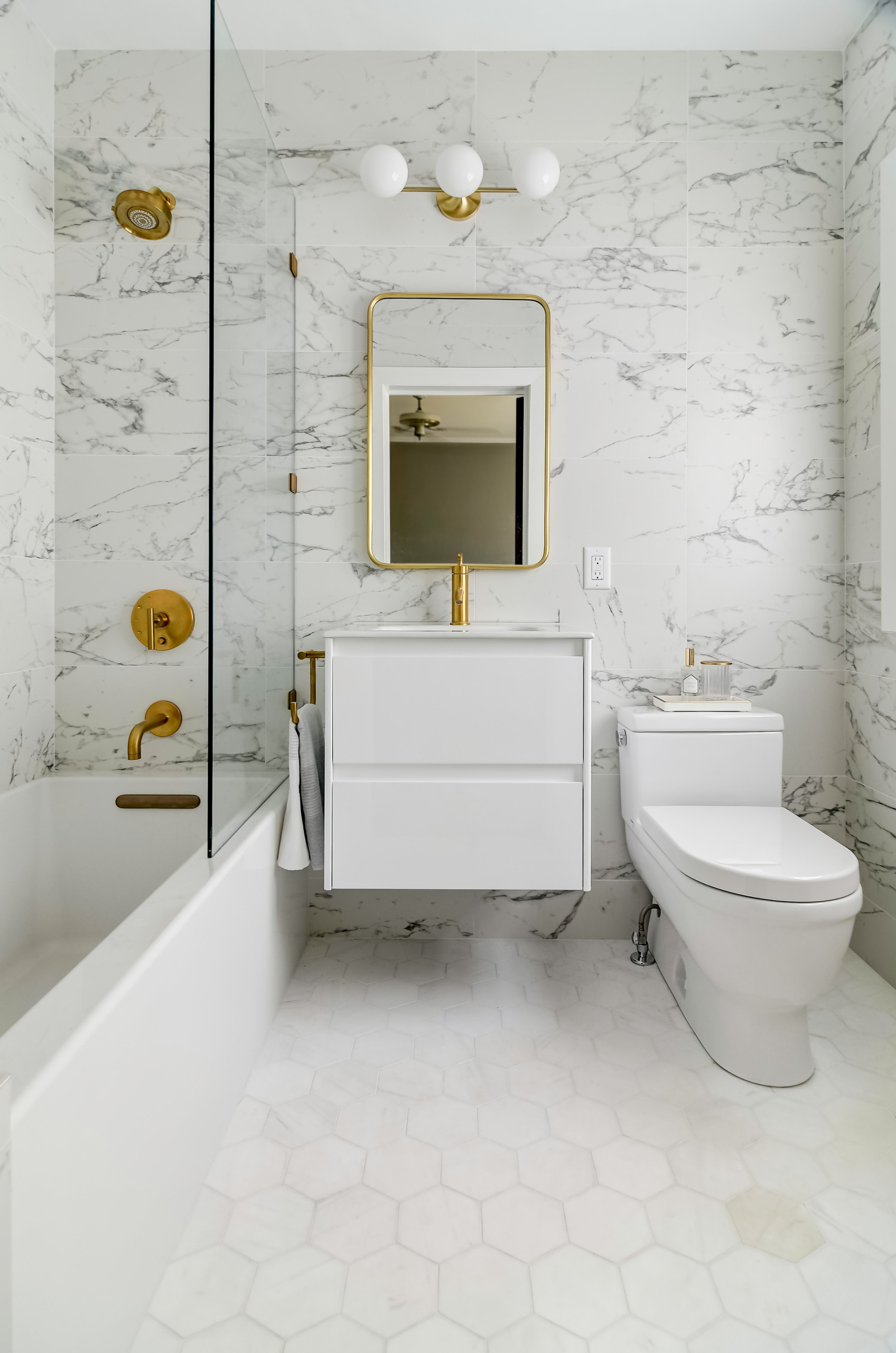 Luxury marble and gold bathroom Austin TX