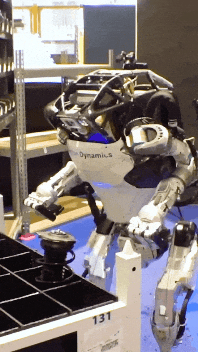 Humanoid robot in modern warehouse automation setting