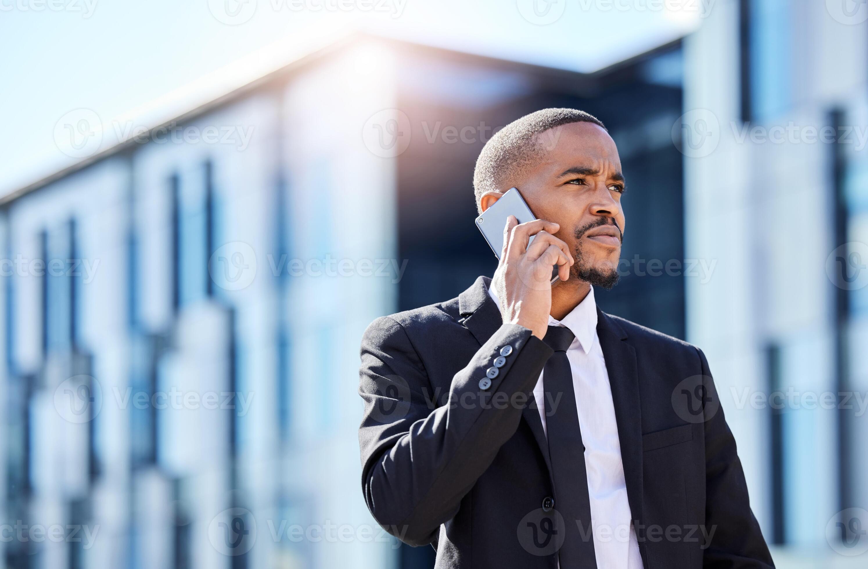 African businessman on phone call for sales outreach