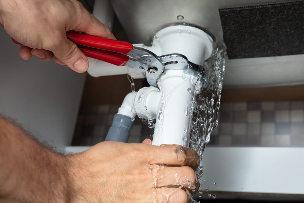 Under sink plumbing and drain repair