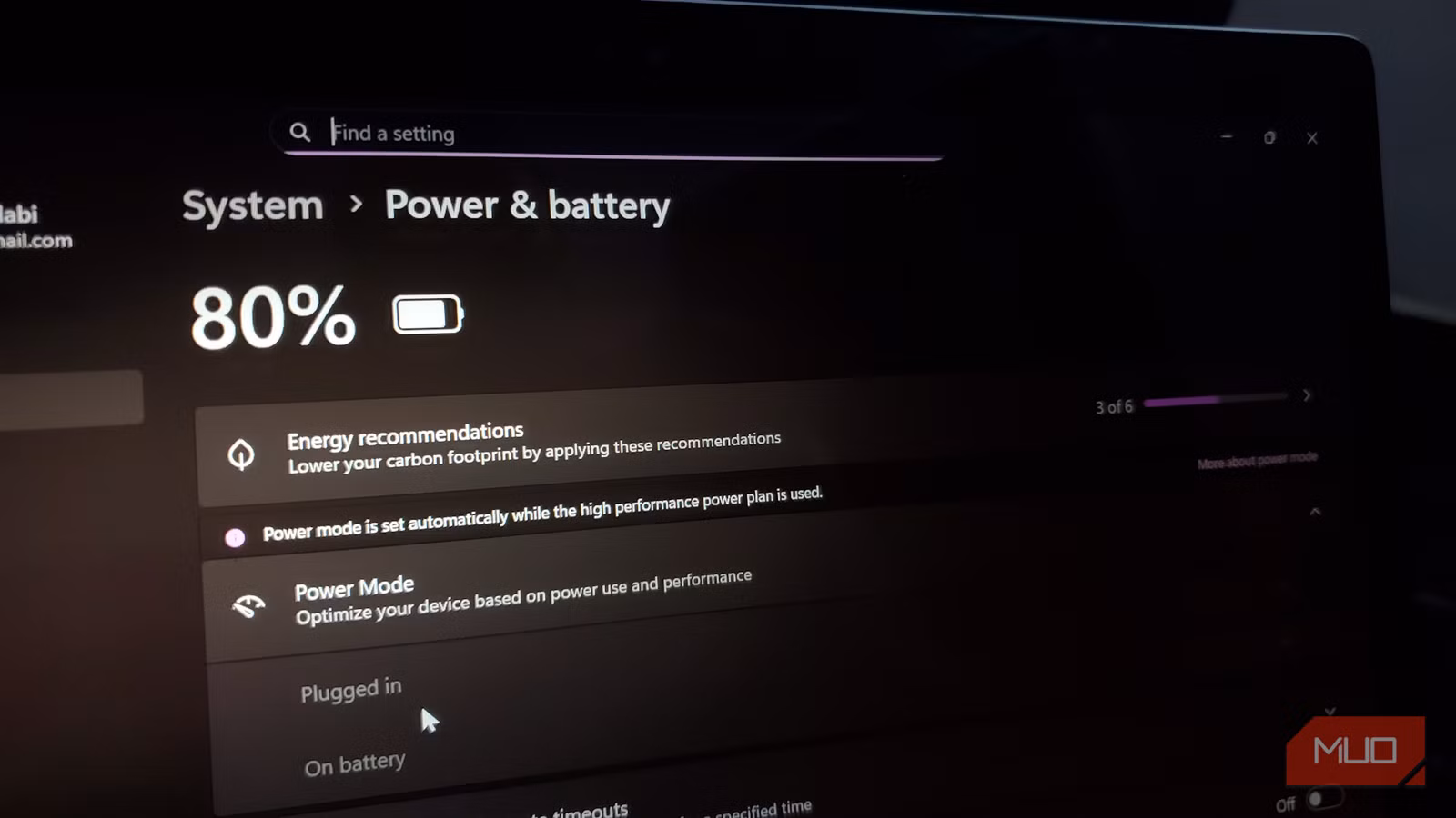 Windows laptop showing Power and battery settings with energy recommendations and power mode options
