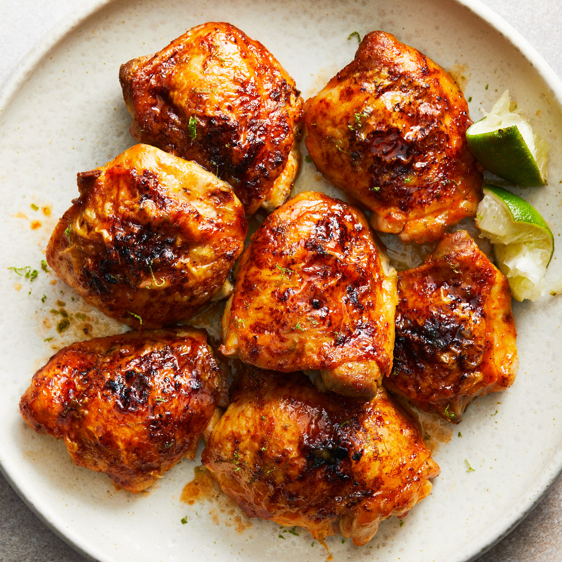 Roasted hot honey chicken thighs with lime glaze sheet pan dinner