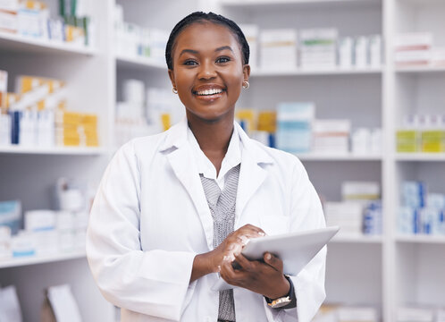 Professional African female pharmacist in modern pharmacy