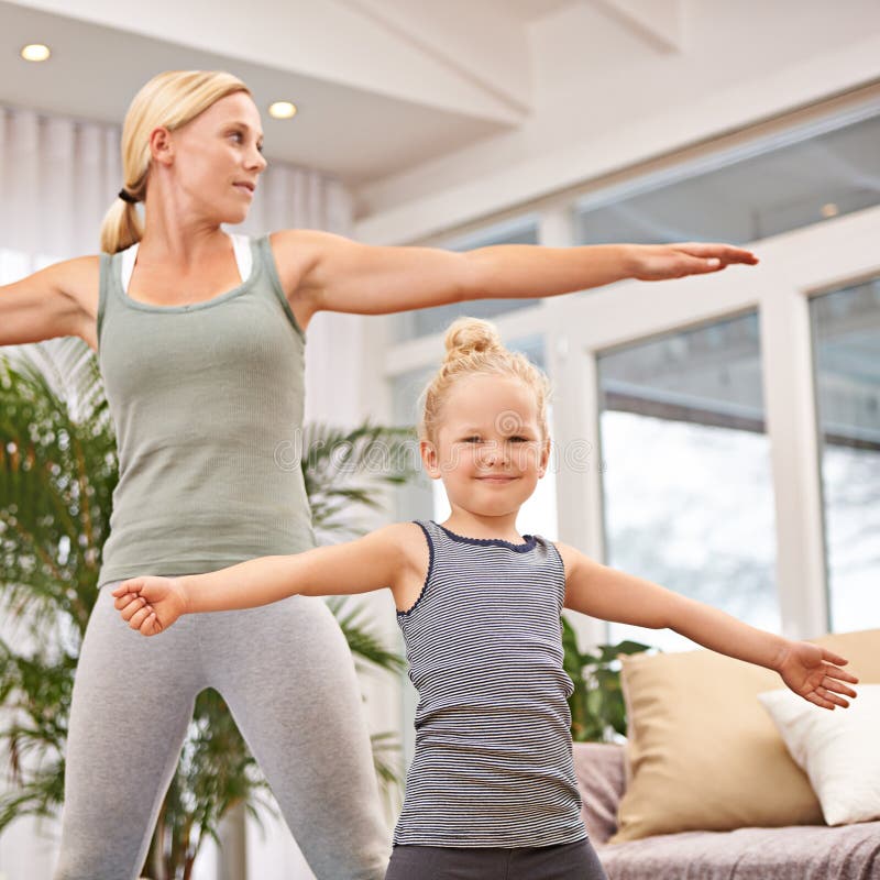 Yoga, Exercise with Mother and Child in Living Room, Stretching Out Arms  for Balance and Bonding. Woman, Young Girl and Stock Image - Image of  exercise, room: 310762079